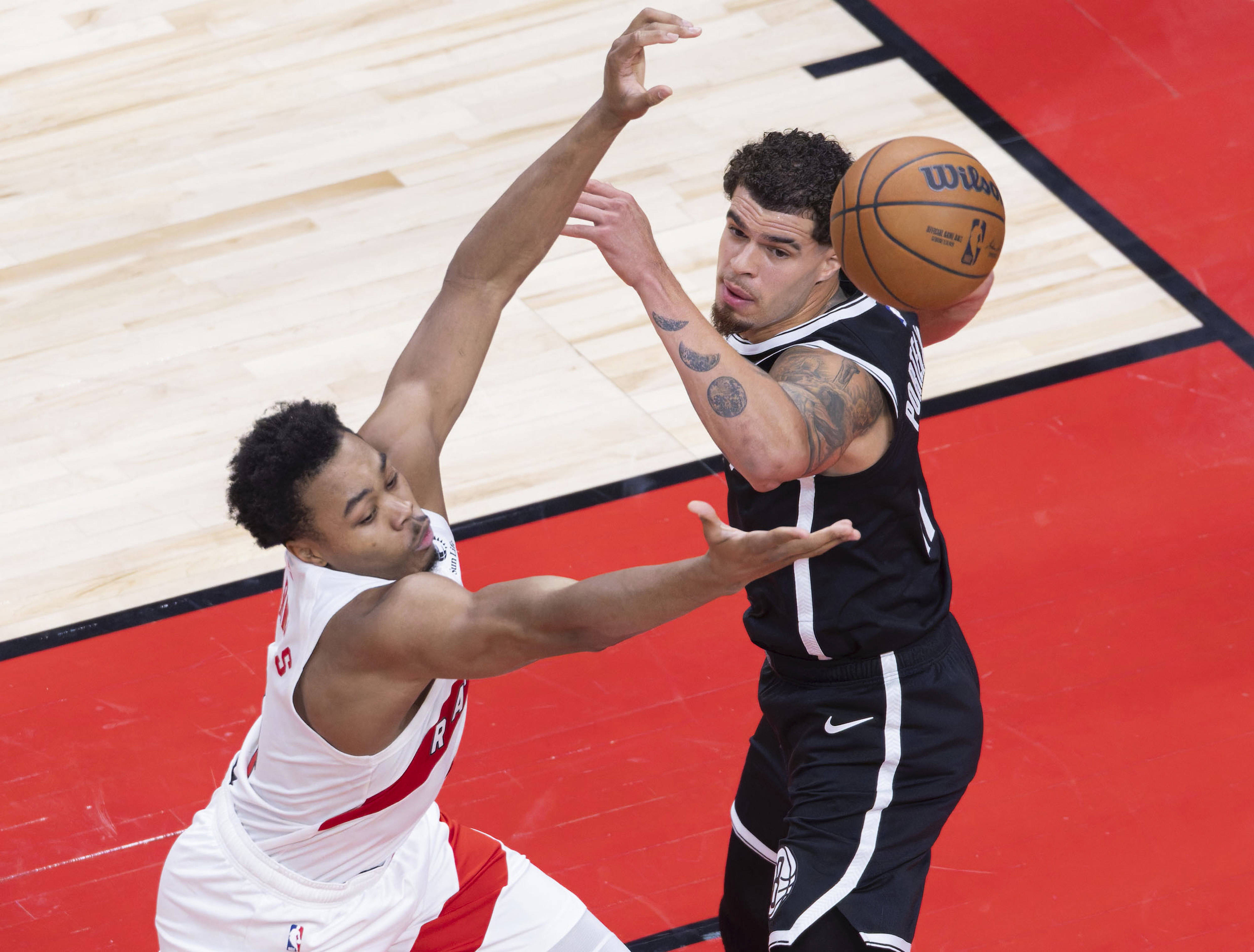 (体育)籃(lán)球——NBA季前賽(sài):猛龙胜籃(lán)网