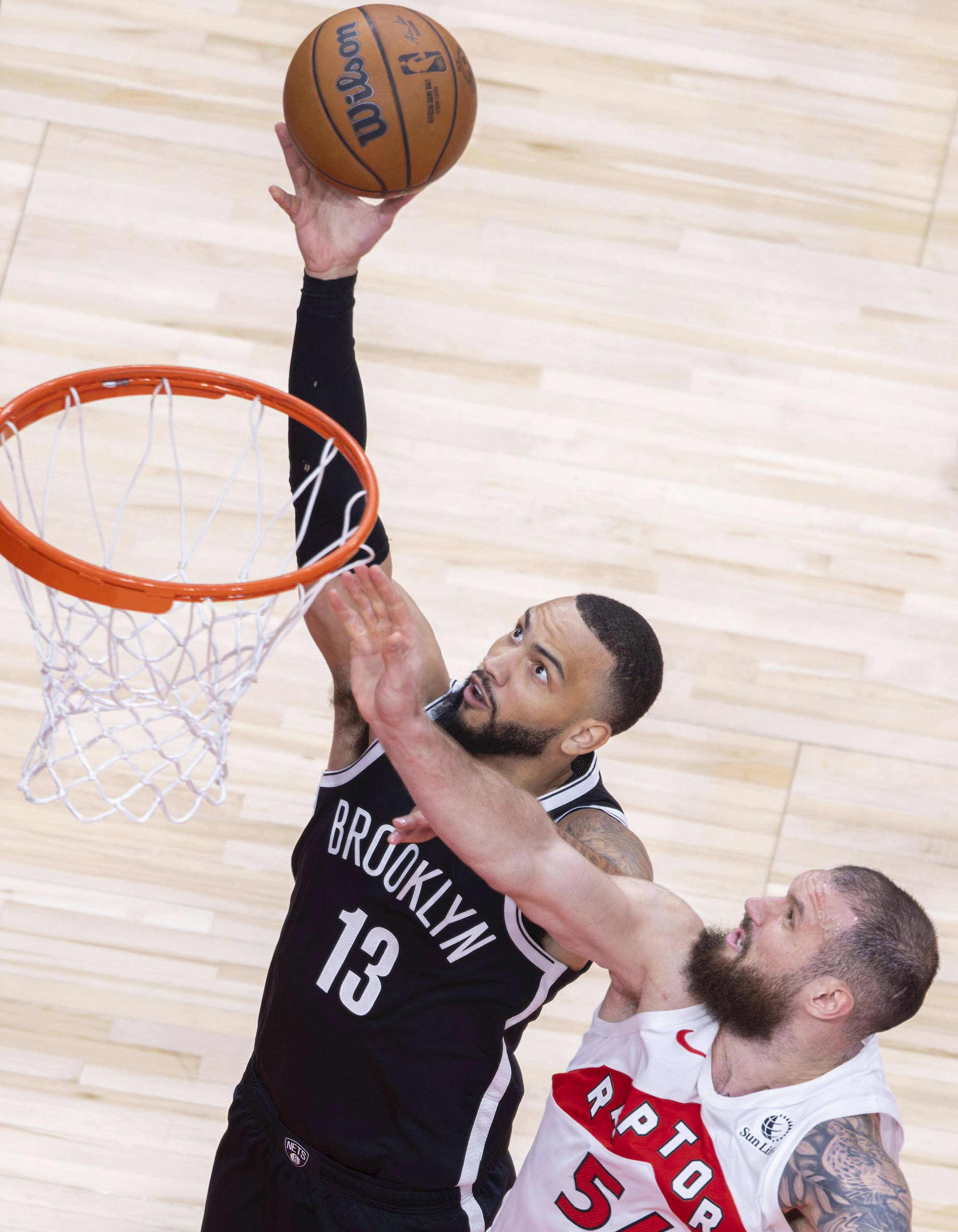 (体育)籃(lán)球——NBA季前賽(sài):猛龙胜籃(lán)网