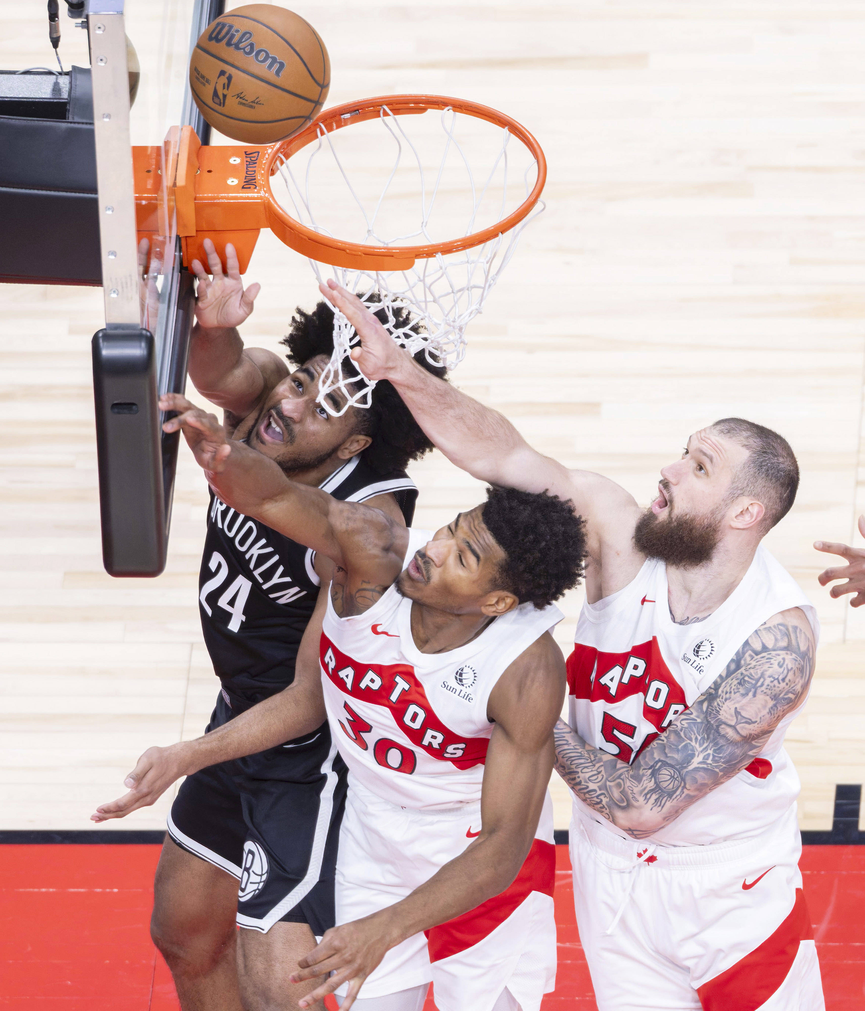 (体育)籃(lán)球——NBA季前賽(sài):猛龙胜籃(lán)网